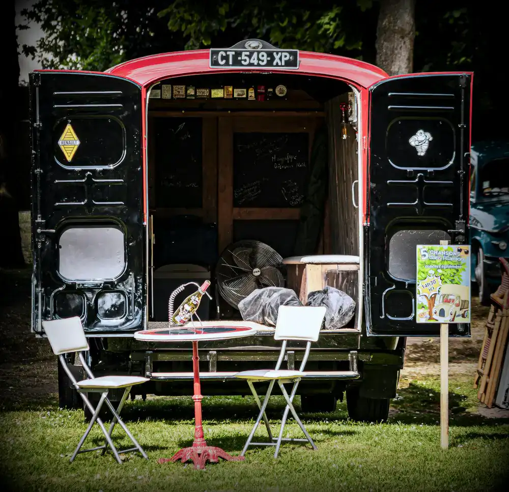 The mobile pizza van set up during a sunny afternoon event